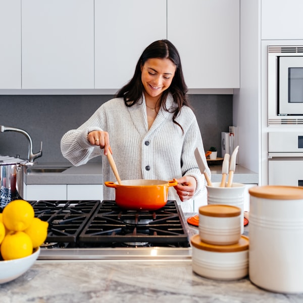 A carer preparing a meal at home